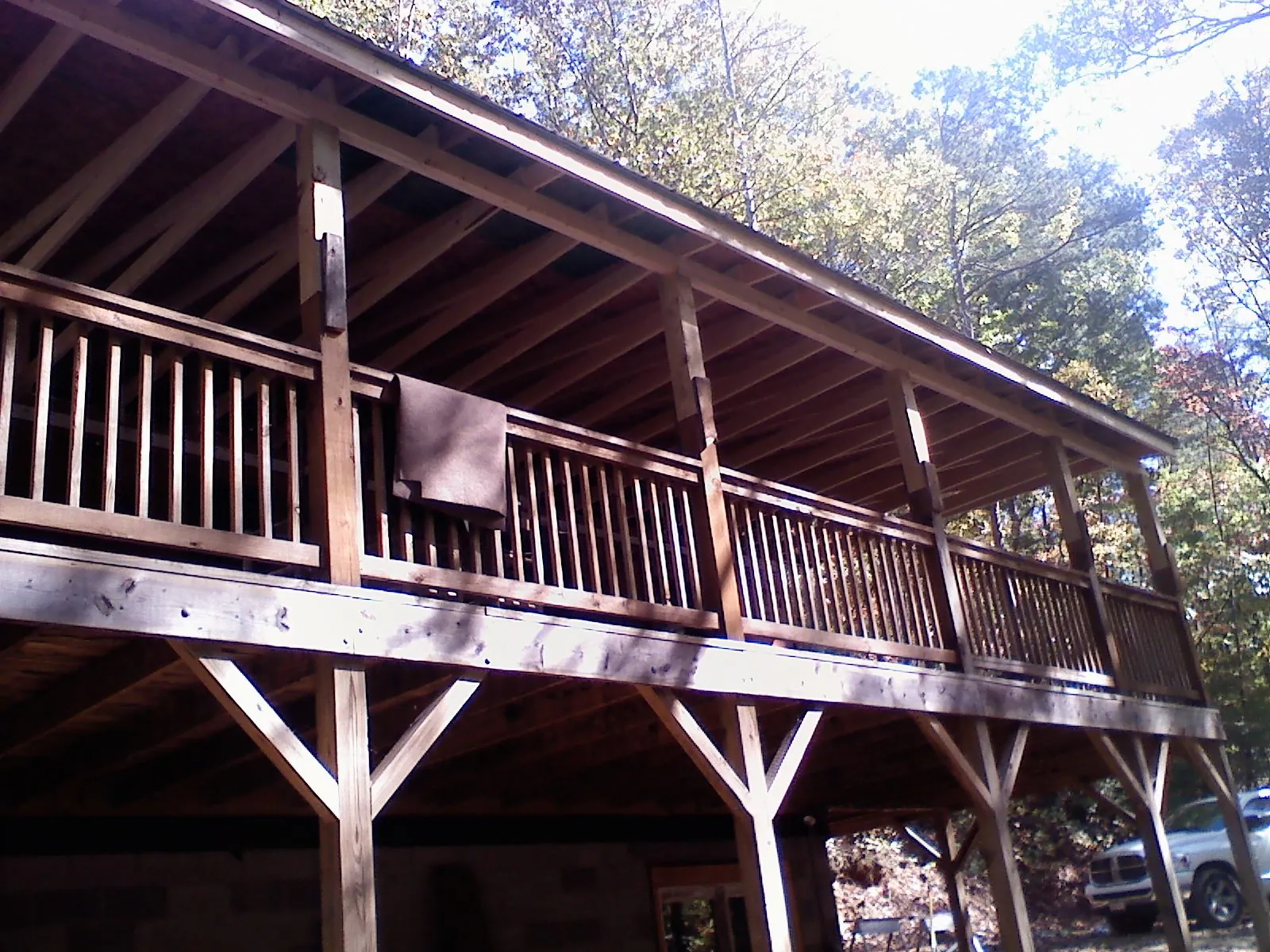 Timber framing under a new elevated porch and deck — Roof Leak Repair in Poole by Roofing Brothers